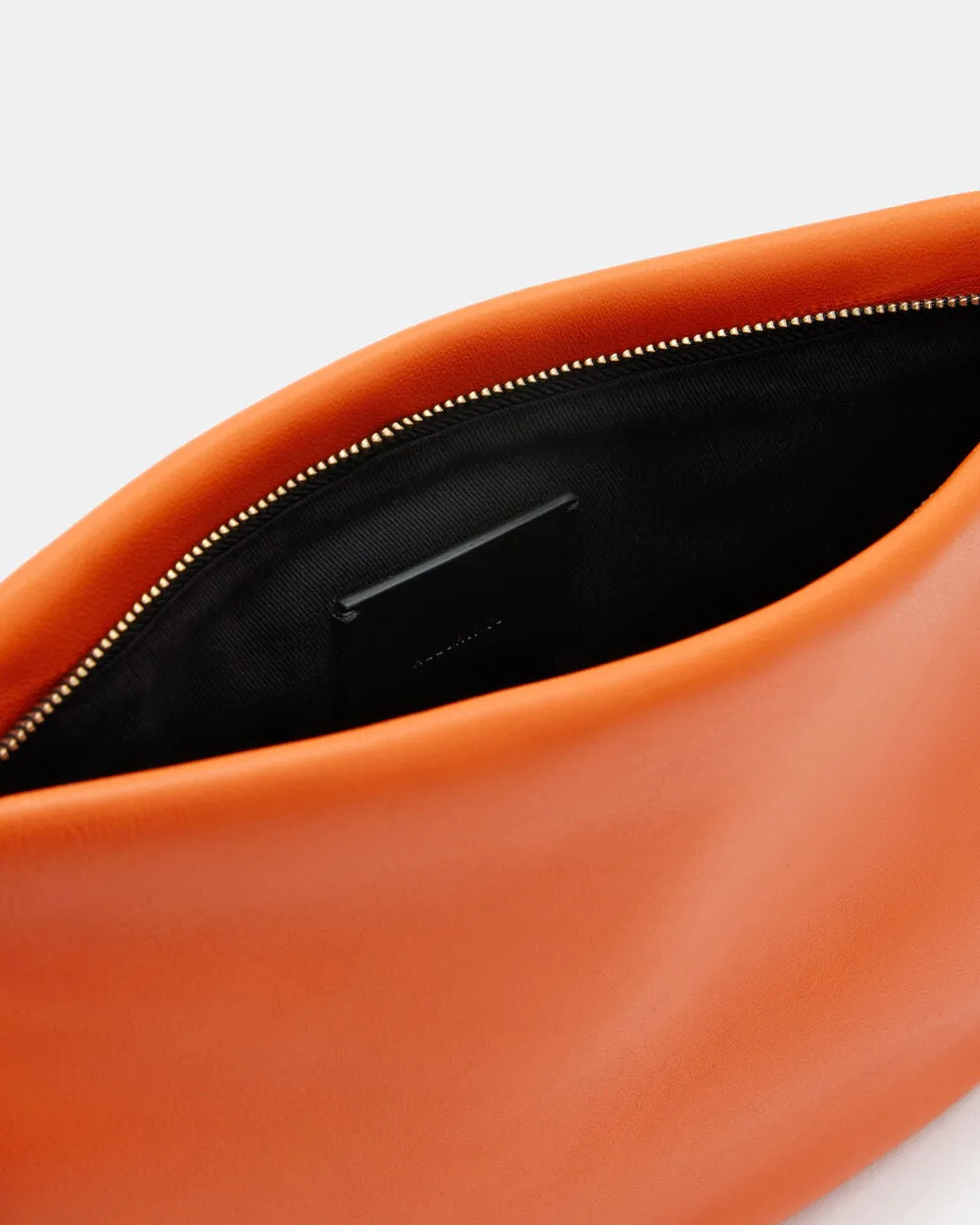 Bettina leather clutch with AllSaints chain, orange pyrol