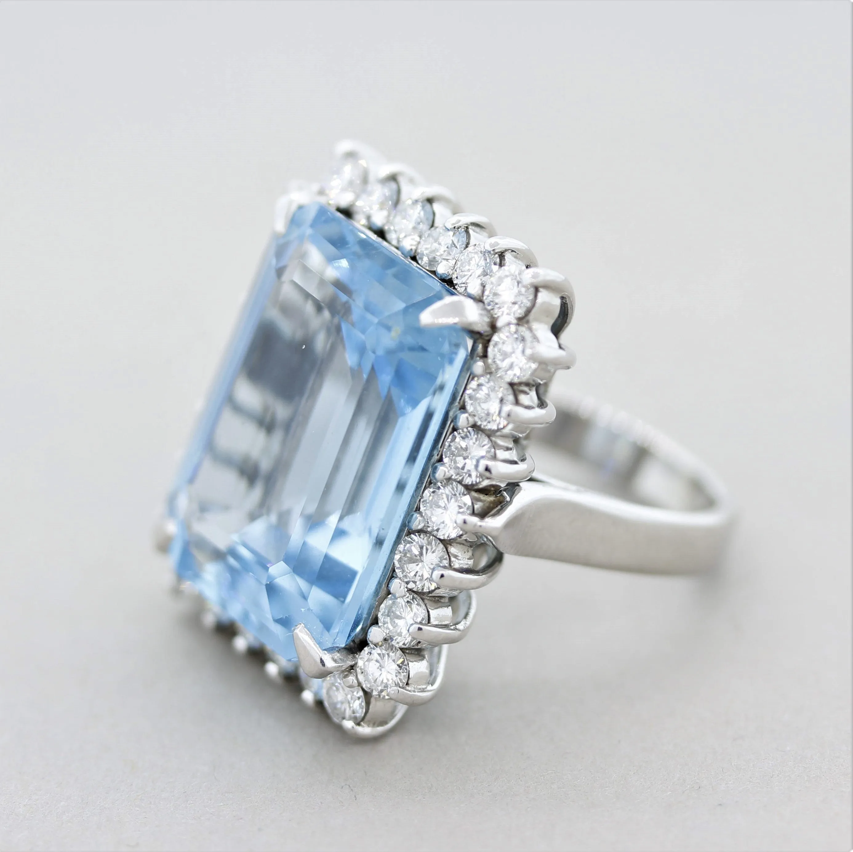 Swiss Blue Topaz Diamond Halo Platinum Cocktail Ring